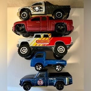 5 Hot Wheels & Matchbox trucks Dodge D-200, Ram Flatbed, Chevy, Mazda, Subaru